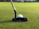 Improve your putting in golf by using a very simple, yet effective putting drill. This will make you a better putter and will make the game more fun.
