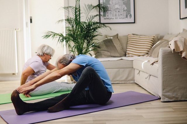 Man and woman on yoga mats