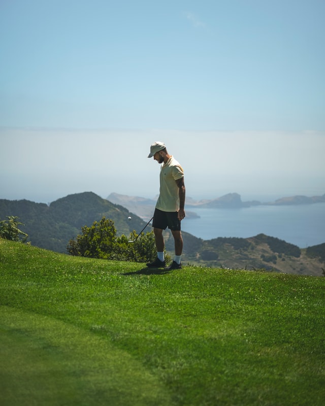 Skilled golfer by the sea Skilled golfer by the sea