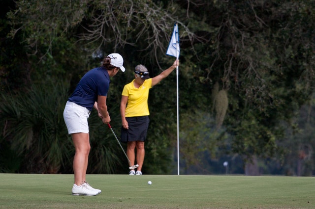 Two female golfers on the green